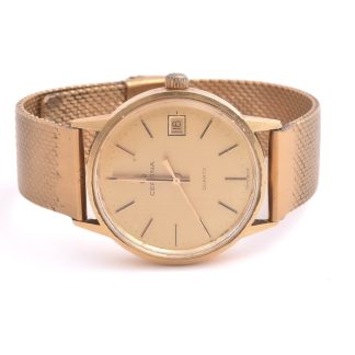 HERRUR CERTINA Q 34MM, 18K I BOETTEN, LÄNK I FÖRGYLLT STÅL (BATTERI SLUT, REPIGT GLAS, SKADOR PÅ LÄNKEN)