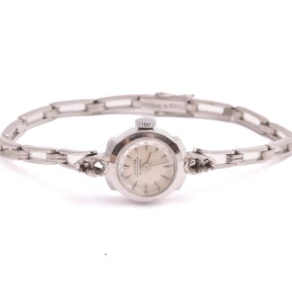 DAMUR GLYCINE AHLBERG MEKANISK 14MM, 18K VITGULD I BOETT & LÄNK, 17CM (4 DIAMANTER PÅ BOETTEN SAKNAS, SKADOR PÅ GLASET) LÄNK TILLV. GÖTEBORG 1958, TOTAL VIKT: 16,1G