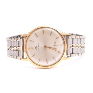 HERRUR MOVADO MEKANISK 34MM (DEFEKT!! KRONAN SAKNAS, ARMLÄNK EJ ORIGINAL) 18K I BOETTEN