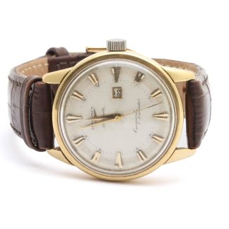 DEFEKT HERRUR LONGINES AUTOMATIC CONQUEST CALENDAR, MED DATUM & LÄDERBAND / 18K I UR, TOTALVIKT: 59,2G INKL URVERK, METALL, GLAS OCH LÄDERBAND - OBS! REPOR, NAGG OCH FUKTSKADOR, URET GÅR MEN SÄLJES SOM DEFEKT