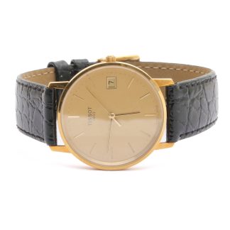 HERRUR TISSOT MONOCOQUE ø 33,5MM DATUM, QUARTZ, ORIGINAL LÄDERBAND / 18K GULD I BOETTEN - OBS! GRAVYR PÅ BAKSIDAN, BATTERIET ÄR SLUT!