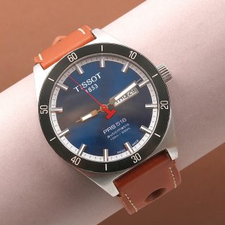 HERRUR TISSOT PRS 516 AUTOMATIC 100M DAYDATE. 42MM