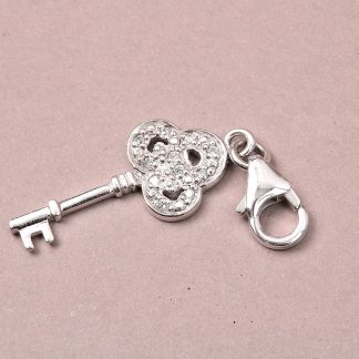 HÄNGE NYCKEL MED STENAR I SILVER, GULDFYND, L 3,8 CM