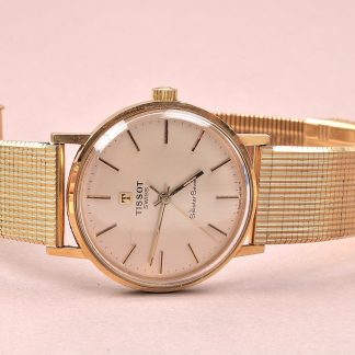 HERRUR TISSOT SEASTAR SEVEN MEKANISK, 34 MM, 18K I BOETTEN, GRAVYR ,