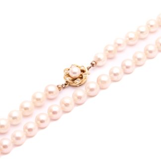 PÄRLCOLLIER MED ODLADE PÄRLOR, GULD OCH DIAMANTER I LÅSET: TOT. CA: 0,10CT, 72,5CM, BREDD: ø 7MM - TILLV. J.KÖHLE TYSKLAND - TOTALVIKT: