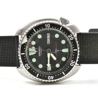 HERRUR: SEIKO AUTOMATIC DIVER 150M 6309-7040 1980-TAL, 43MM, ”TURTLE”, LITEN REPA PÅ GLAS, DYKRINGEN GÅR ATT VRIDA ÅT BÅDA HÅLLEN. LÄNKEN BEHÖVER BYTAS
