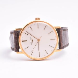 HERRUR LONGINES MEKANISK 34MM, 18K I BOETTEN, GRAVYR PÅ BAKBOETTEN, SERIENR: 53782106 (PÅ URVERKET), TILLV. CA 1977, KALIBER: 6942