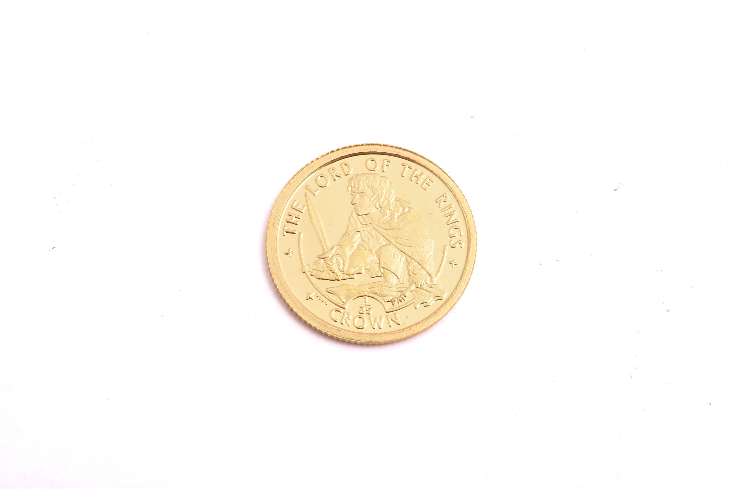 MINNESMYNT FINGULD 999,9 SAGAN OM RINGEN, ISLE OF MAN 2003, 1/25 OZ (SKA VARA 1,24G MEN VISAR 1,3G PÅ VÅGEN) LIMITERAD TILL 5000 EX, I PLASTETUI M INFORMATIONSFOLDER I ORIG ETUI