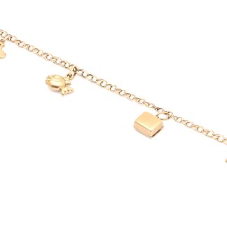 INVESTERINGSGULD: DEFEKT ARMBAND MED BERLOCKER