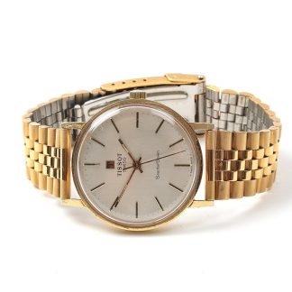 HERRUR TISSOT SEASTAR SEVEN , 33 MM, MED GRAVYR, 18K I BOETTEN URET GÅR MEN SÄLJS UTAN FUKTIONSGARATI